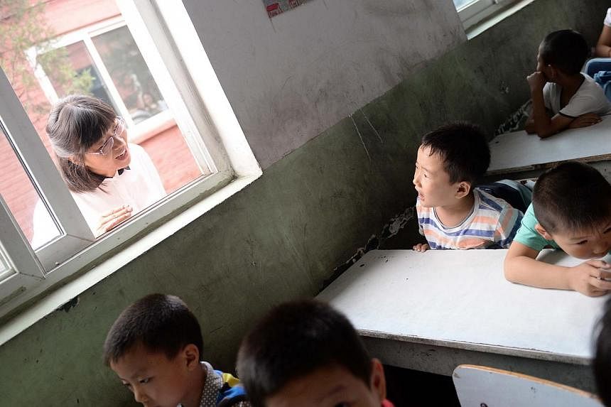Pupils at a non-formal private school for the children of migrant workers in Beijing. A huge gap exists in educational opportunities between students from rural areas and those from cities.