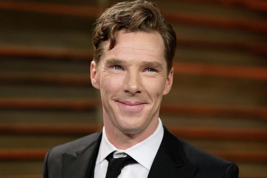 Actor Benedict Cumberbatch smiles as he arrives at the 2014 Vanity Fair Oscars Party in West Hollywood, California in this March 3, 2014, file photo.&nbsp;Cumberbatch and his new film The Imitation Game could bring unsung British World War II hero Al