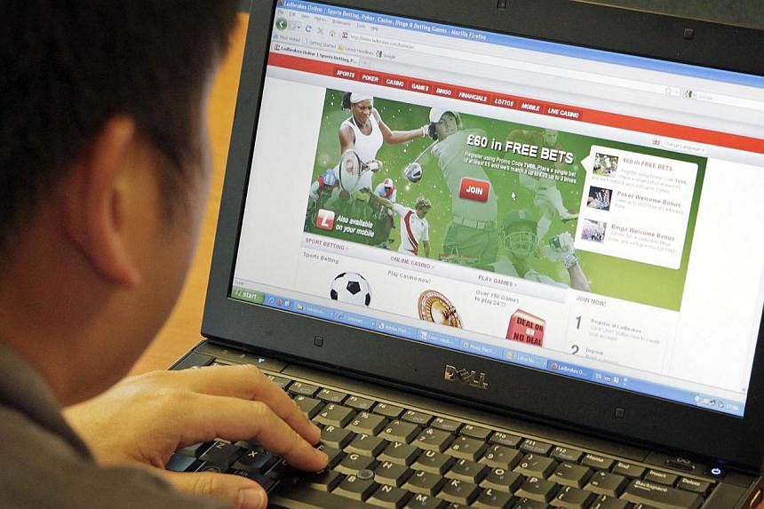 What you need to know about the Remote Gambling Bill, which was tabled in Parliament on Monday to tackle the rise of online gambling. -- PHOTO: ST FILE&nbsp;
