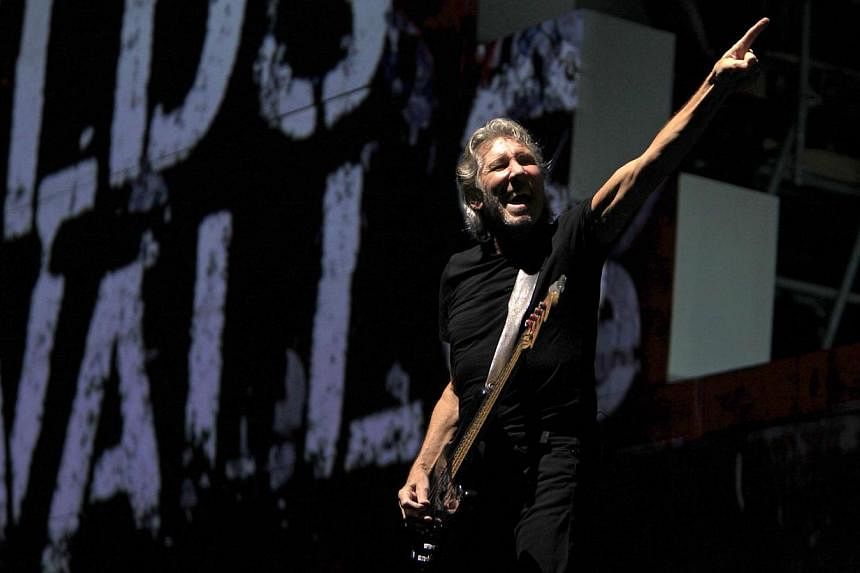 Former Pink Floyd co-founder and bass guitarist Roger Waters performs during "The Wall" tour live concert in Bucharest in this Aug 28, 2013, file photo. -- PHOTO: REUTERS