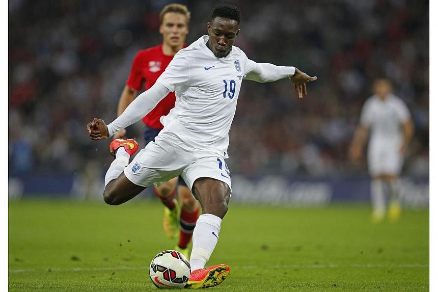 England manager Roy Hodgson said Danny Welbeck had proved his worth at centre-forward after scoring twice in a 2-0 victory over Switzerland in his side’s opening Euro 2016 qualifier. -- PHOTO: AFP