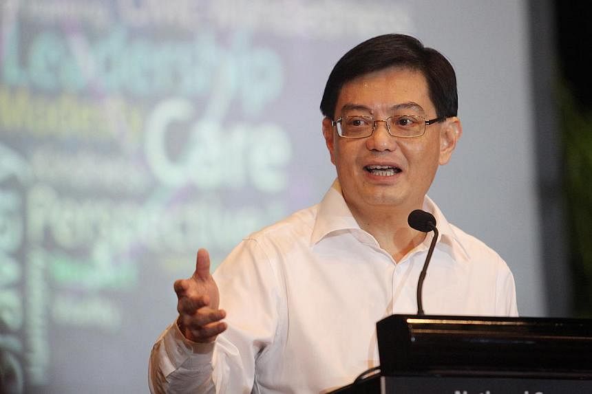 Mr Heng Swee Keat identified three action areas to achieve the desired outcomes. These are: integrate theoretical and applied learning; learn at every stage of your career and in every way; and respect everyone. -- PHOTO: MY