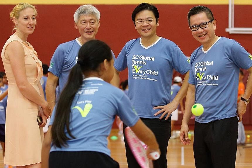 (From left) Ms Melissa Pine, tournament director of Women’s Tennis Association (WTA); Mr Edwin Lee, president of Singapore Tennis Association (STA); Mr Lawrence Wong, Minister of Culture, Community and Youth (MCCY); &nbsp;Mr Simon Cheong, chief exe