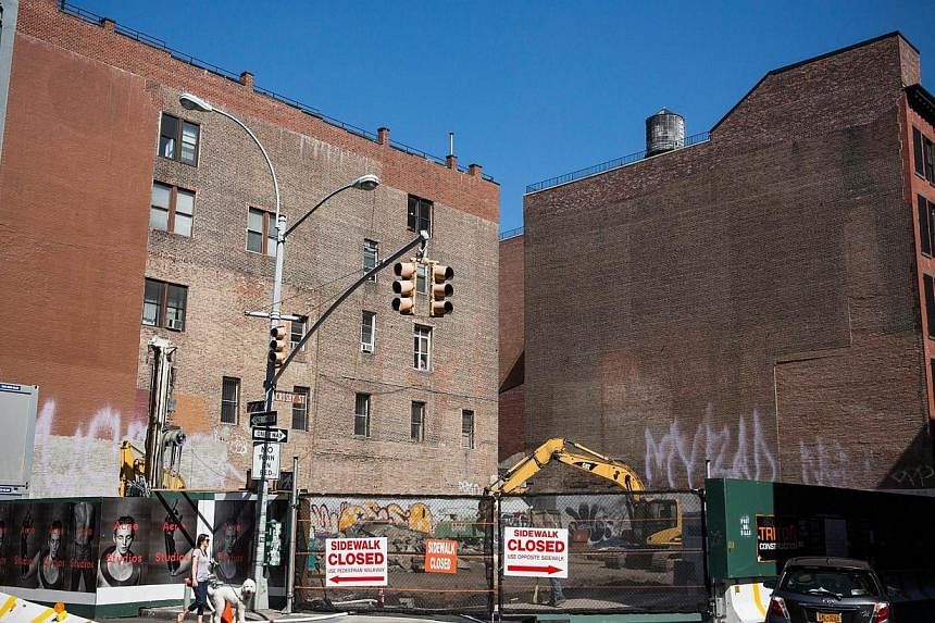The construction site at 42 Crosby Street, which is being developed into a luxury apartment building with 10 subterranean parking spaces priced at US$1 million (S$1.3 million) per parking space, is seen on Sept 10, 2014 in the SoHo neighborhood of Ne