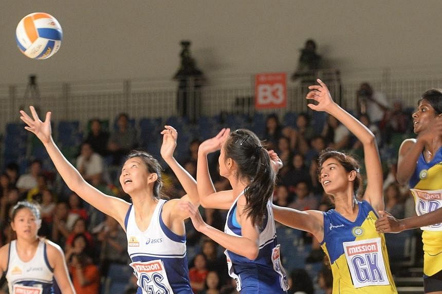 Day five of the Asian Netball Championship. Singapore ended their Mission Foods Asian Netball Championship Group A campaign on a high note, with a 73-20 victory over India at the Sports Hub's OCBC Arena on Thursday evening. -- ST PHOTO:&nbsp;AZIZ HUS