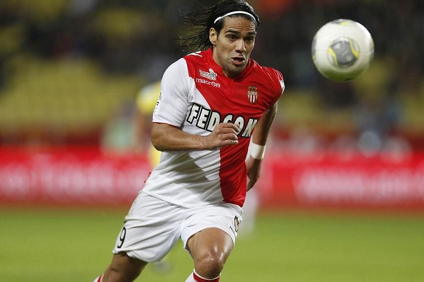 This file picture taken on Nov 8, 2013 show Monaco's Colombian forward Radamel Falcao eyeing the ball during the French L1 football match Monaco (ASM) vs Evian TG (EVTG) at the Louis II Stadium in Monaco.&nbsp;Scholes believes the club's outlay of ov