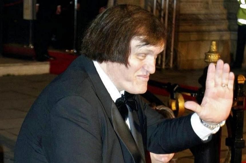 Richard Kiel, who played the towering, steel-toothed baddie Jaws in two James Bond movies, died on Wednesday aged 74, a hospital spokesman said. -- PHOTO: REUTERS