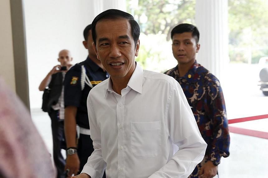 Indonesian president-elect Joko Widodo wants the top court to overturn legislation that makes it more difficult to investigate lawmakers for graft, an adviser said, referring to a law passed with little publicity in one of the world's most corrupt co
