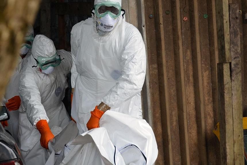 The Red Cross said on Thursday it planned to train more than 2,000 extra volunteers to step up its response to the deadly Ebola outbreak ravaging west Africa. -- PHOTO: AFP