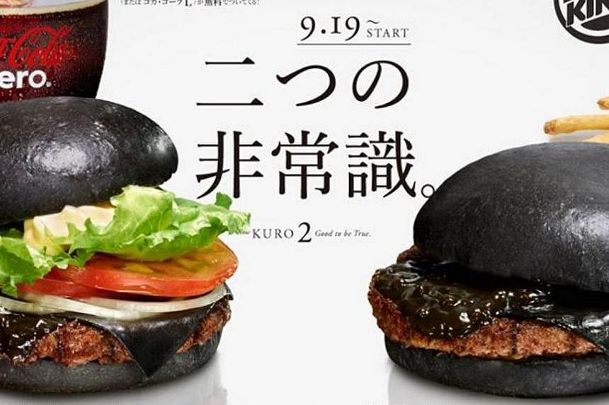 Japan's Burger King, from Sept 19, will sell two black burgers - the Kuro Pearl priced at 480 yen (S$5.67) and the Kuro Diamond at 690 yen (S$8.15).&nbsp;-- PHOTO : BURGER KING