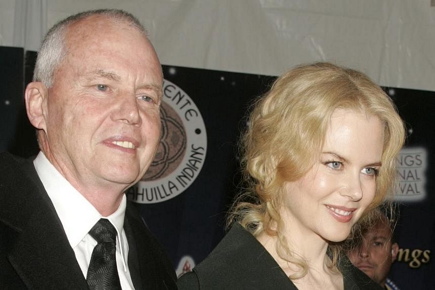 Actress Nicole Kidman is escorted by her father, Dr Antony Kidman, as she arrives at the 2005 Palm Springs Film Festival Gala dinner in Palm Springs, California in this Jan 8, 2005, file photo. -- PHOTO: REUTERS