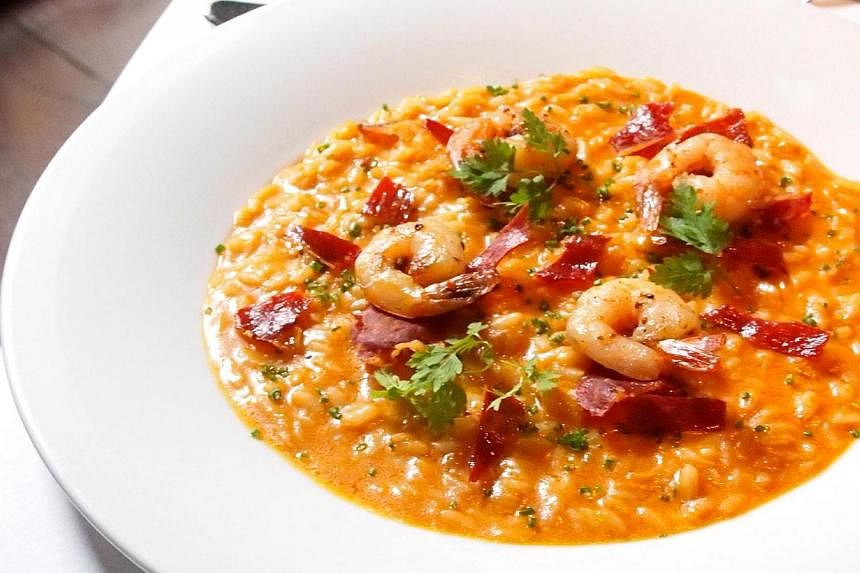 Senso is bringing back its F1-themed brunch on Sept 21, offering pimped up versions of old favourites such as risotto gamberoni (prawn risotto, above) finished with champagne and pancetta flakes, and caramelised apple tart. -- PHOTO: SENSO RISTORANTE