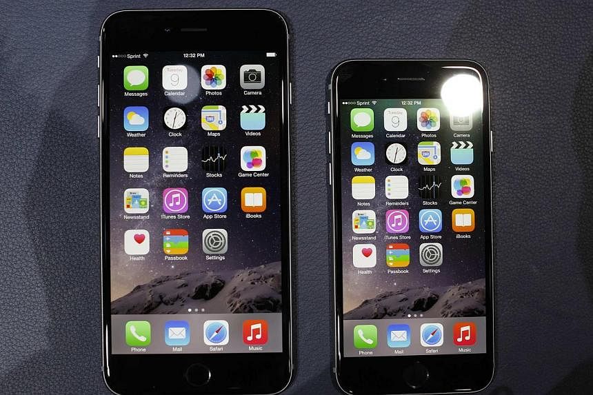The iPhone 6 and the iPhone 6 Plus are shown during an Apple event at the Flint Center in Cupertino, California, on September 9, 2014. -- PHOTO: REUTERS