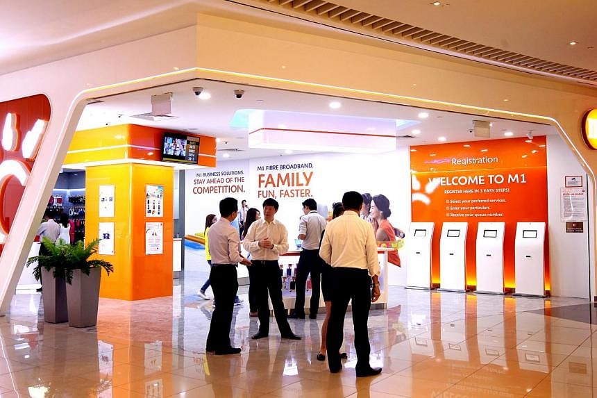 Joining the price war over Singapore's broadband space, M1 has halved the price of its 1Gbps home broadband plan to $49 a month for an undisclosed "limited period". The usual price is $99 a month.&nbsp;-- ST PHOTO:&nbsp;CHEW SENG KIM