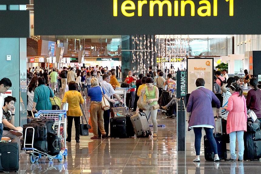 Customer satisfaction at Changi Airport has fallen by 12 per cent this year - the biggest drop among Singapore's transport sectors.&nbsp;-- PHOTO: ST FILE