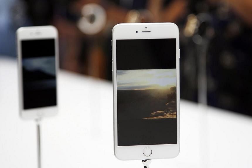 A new Apple iPhone 6 Plus is seen during an Apple event at the Flint Center in Cupertino, California, on Sept 9, 2014. -- PHOTO: REUTERS