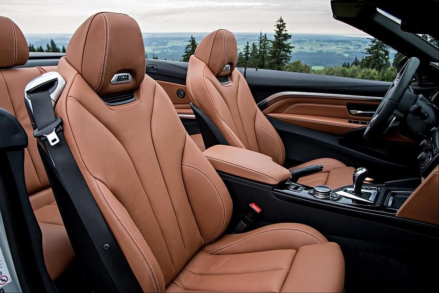 The BMW M4 Convertible’s folding hard-top takes 20 seconds to open or close. -- PHOTO: BMW