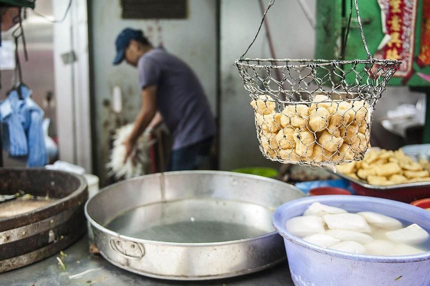 Street food is seen in the Central district of Hong Kong on Sept 8, 2014. The head of a Taiwanese company at the centre of a widening food safety scandal has been detained for selling hundreds of tonnes of "gutter oil" that caused mass product recall