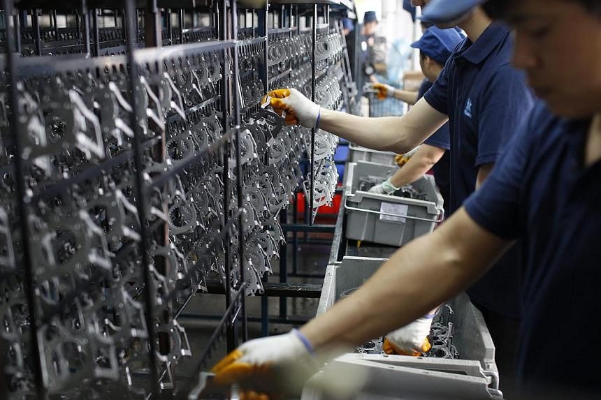 China's factory output grew at the lowest pace in nearly six years in August while growth in retail sales and investment also cooled, adding to signs of fragility in the economy that may prod Beijing into fresh policy measures to prevent a sharper sl