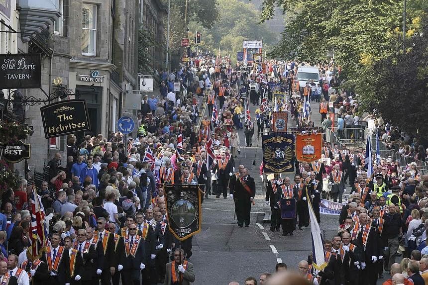 Members of the Orange Order march during a pro-Union rally in Edinburgh, Scotland on Sept 13, 2014. -- PHOTO: REUTERS