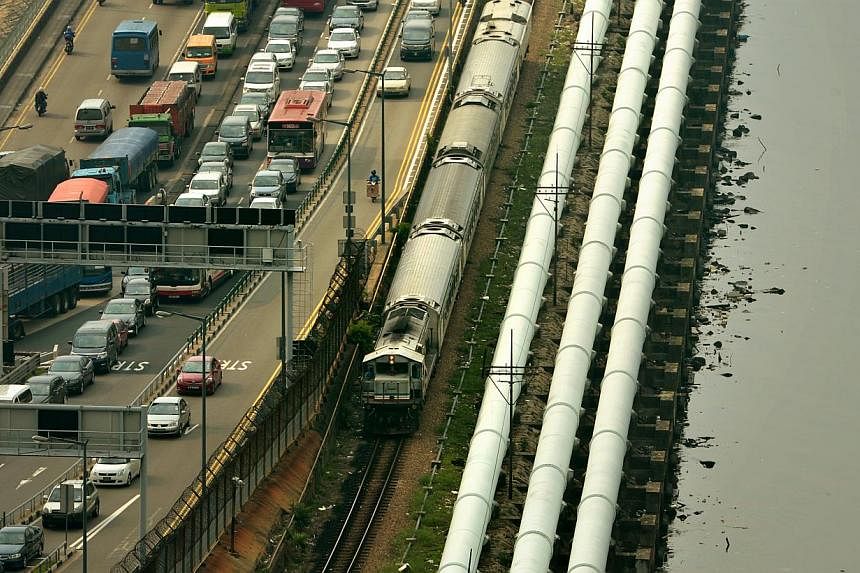 The Johor state government wants Keretapi Tanah Melayu Bhd (KTMB) to increase its rail service across the Causeway to hourly trips, as an alternative for commuters burdened by new toll fares at the Singapore checkpoint. -- PHOTO: ST FILE