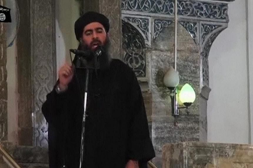 A group of militants in Algeria calling itself the Caliphate Soldiers has split from Al-Qaeda and sworn loyalty to Abu Bakr al-Baghdadi (above) and his Islamic State in Iraq and Syria. -- PHOTO: REUTERS&nbsp;