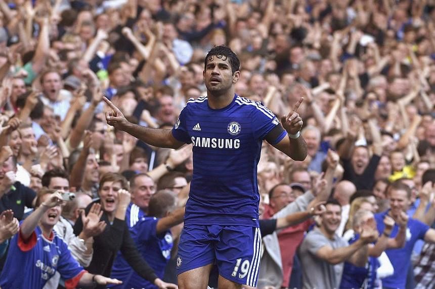 Chelsea's Diego Costa celebrates scoring a third goal against Swansea during their English Premier League soccer match at the Stamford Bridge in London on Sept 13, 2014. &nbsp;-- PHOTO: REUTERS
