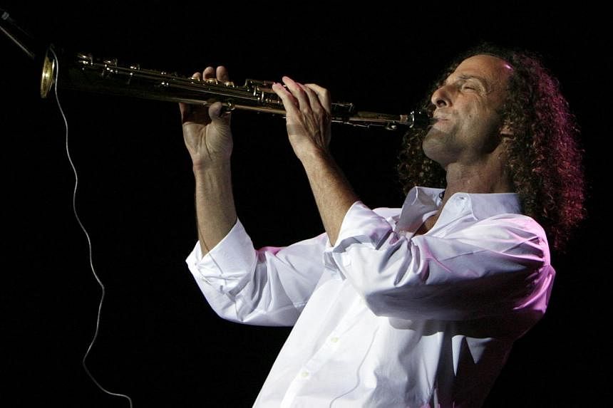 US jazz musician and saxophonist Kenneth Gorelick, known as Kenny G, performs during a concert in Hong Kong as part of his "Rhythm and Romance" world tour in this May 9, 2008 file photo. -- PHOTO: REUTERS