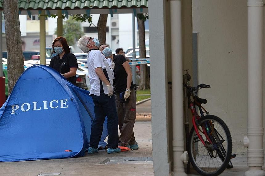 Police suspect foul play after a boy fell to his death at Blk 815, Tampines Avenue 4.&nbsp;The mother of the seven-year-old boy found dead at the foot of a Tampines HDB block has been arrested for murder.&nbsp;-- ST PHOTO:&nbsp;NG SOR LUAN