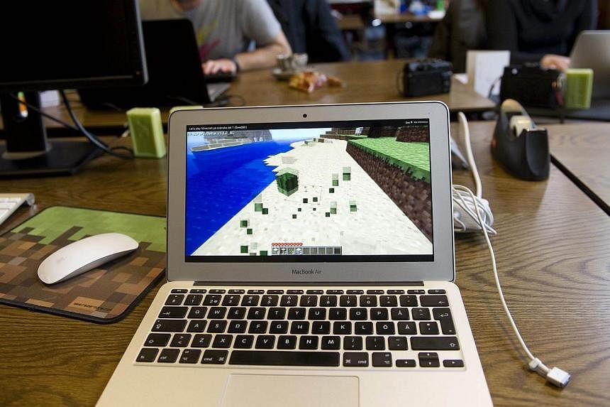 Microsoft said on Monday it has agreed to acquire Stockholm-based games developer Mojang and the company’s wildly popular Minecraft video game franchise for US$2.5 billion (S$3.2 billion). -- PHOTO: AFP