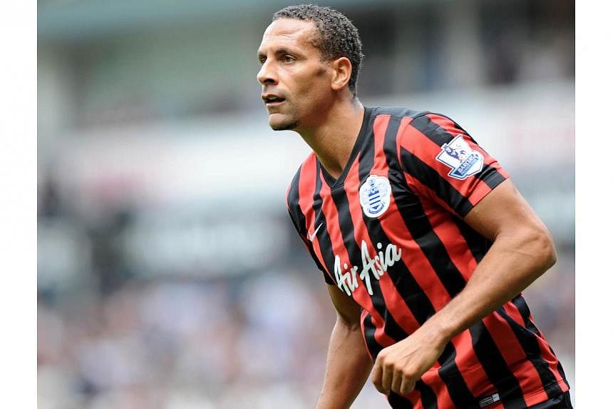 Queens Park Rangers' English defender Rio Ferdinand looks on during the English Premier League football match between Tottenham Hotspur and Queens Park Rangers at White Hart Lane in north London on Aug 24, 2014.&nbsp;Former Manchester United defender