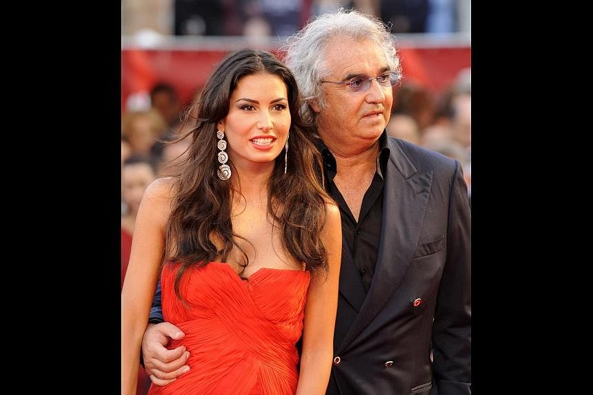 Billionaire Couture's Flavio Briatore on the name of his label. He has a daughter with supermodel Heidi Klum and is now married to ex-Wonderbra model Elisabetta Gregoraci (above, left). -- PHOTO: AGENCE FRANCE-PRESSE