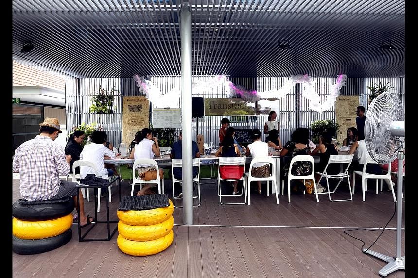 How Do You Lunch is a series of alfresco experiences held on the rooftop of the National Design Centre, which is powered by solar panels. -- ST PHOTO: CHEW SENG KIM