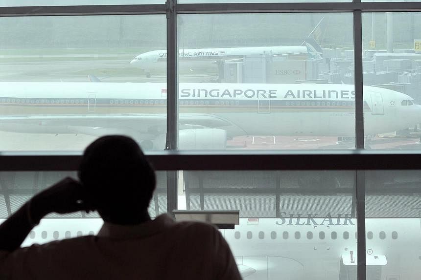 Singapore Airlines plane at Changi Airport on July 18, 2014. -- PHOTO: ST FILE