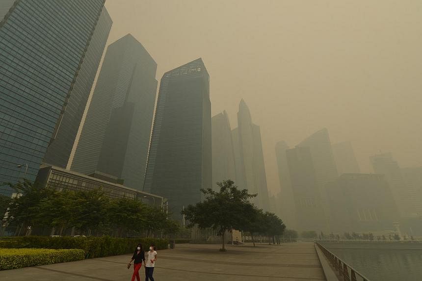 Singapore's Marina Bay is shrouded in haze on June 21, 2013. Indonesia's parliament agreed on Monday to ratify the Asean Agreement on Transboundary Haze Pollution. The delay in ratifying the 2002 pact became a sticking point during last year’s haze