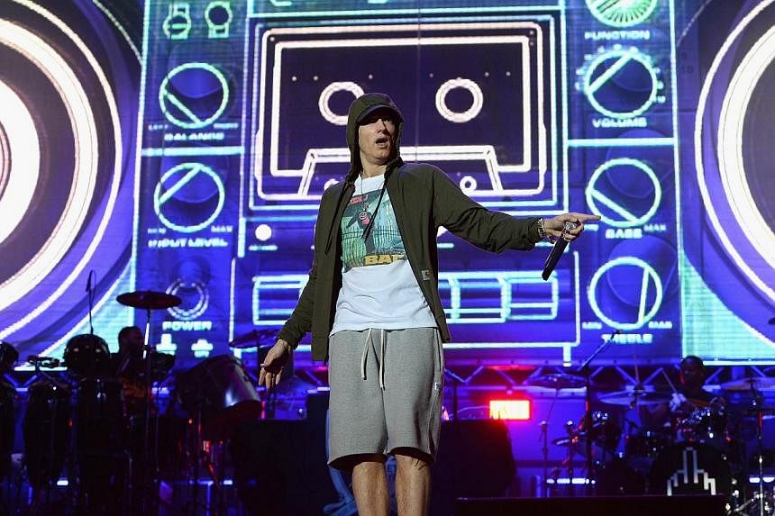 Eminem performs at Samsung Galaxy stage during 2014 Lollapalooza Day One at Grant Park on Aug 1, 2014 in Chicago, Illinois. -- PHOTO: REUTERS