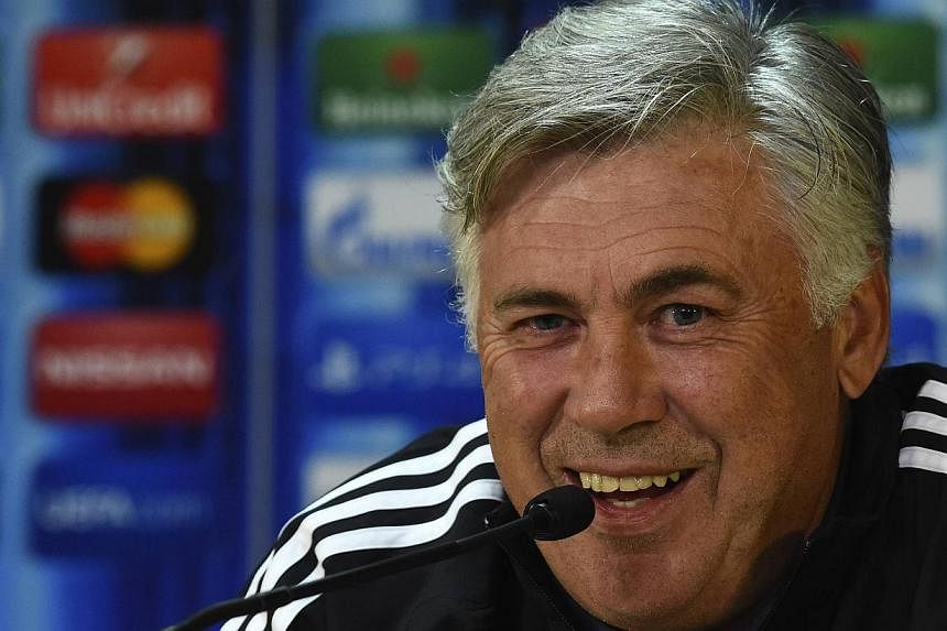 Real Madrid manager Carlo Ancelotti attends a news conference before the team's Uefa Super Cup soccer match against Sevilla at Cardiff City Stadium, Wales, on August 11, 2014. -- PHOTO: REUTERS