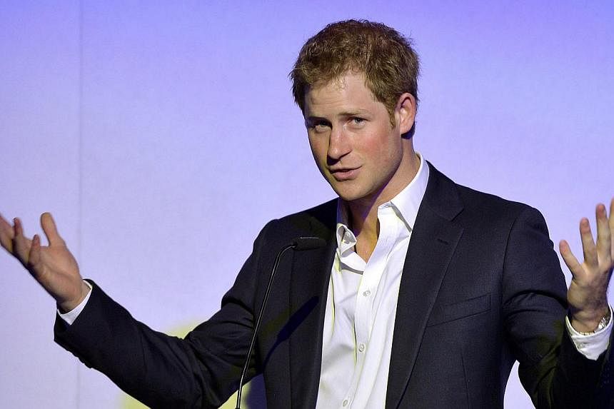 In this file picture taken on May 7, 2014, Britain's Prince Harry delivers his speech during the "Sentebale Summer Party" in London. Prince Harry is celebrating his 30th birthday today, Sept 15, 2014. -- PHOTO: AFP