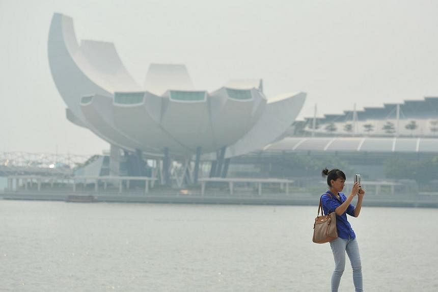 The ArtScience Museum shrouded in haze yesterday as the PSI crossed the 100 mark, with more hot spots in Sumatra in the past week.