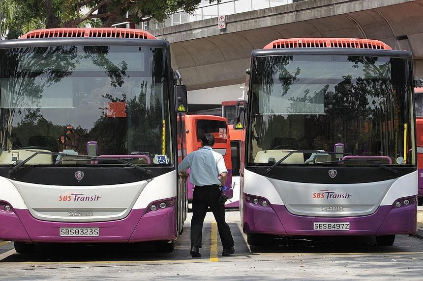 A bus driver at Pasir Ris bus interchange. The Public Transport Tripartite Committee on Tuesday outlined steps to safeguard the job security of bus drivers in the new contracting model. -- PHOTO: ST FILE