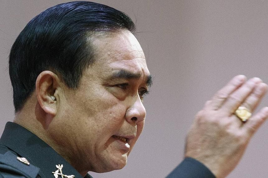Thailand's military ruler Prayuth Chan-ocha, seen here (above) in August, on Wednesday questioned whether tourists in bikinis are safe in the kingdom, in comments following the murder of two Britons whose battered bodies were found on a Thai island. 