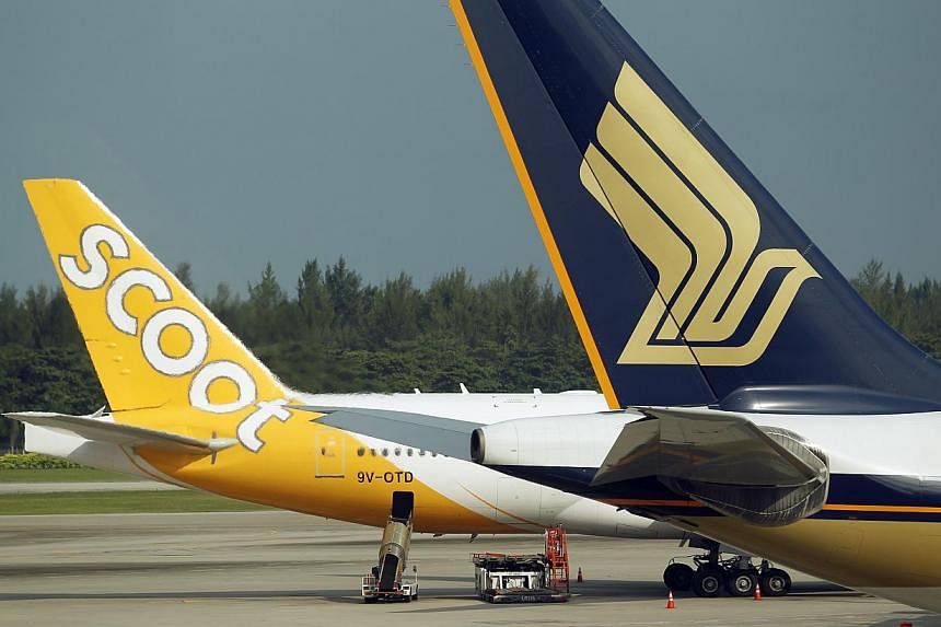 Scoot, Singapore Airlines' long-haul budget carrier, has opened its books for the first time and the picture is not pretty. It revealed losses of more than $25 million in less than two years. -- PHOTO: ST FILE