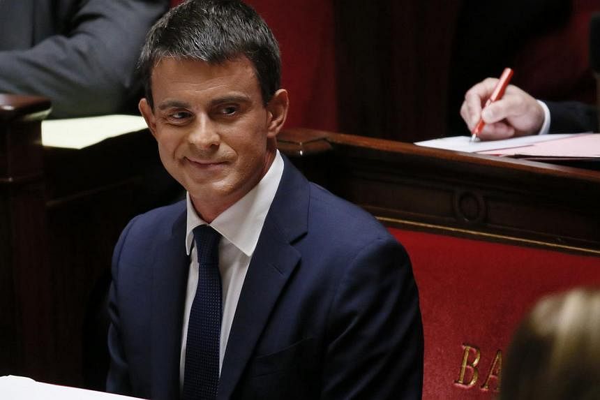 French Prime Minister Manuel Valls reacts before his general policy speech at the National Assembly in Paris on Sept 16, 2014. -- PHOTO: REUTERS