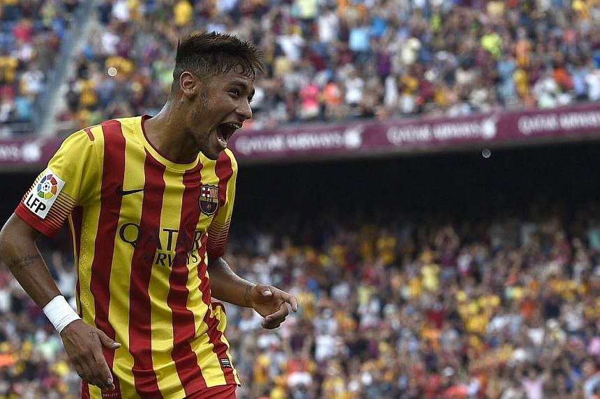 Brazilian football superstar Neymar is set to play at the Singapore Sports Hub after he was included in coach Dunga's squad to face Japan in a friendly on Oct 14. -- PHOTO: AFP