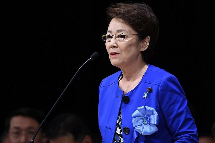 Japanese cabinet minister&nbsp;Eriko Yamatani delivers a speech during a rally to support families of abduction victims by North Korea in Tokyo on Sept 13, 2014. -- PHOTO: AFP