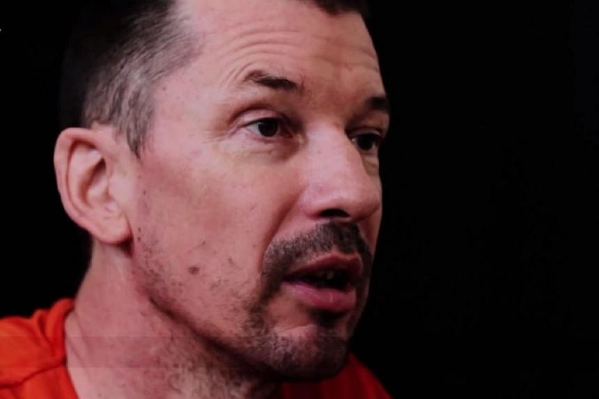 A screenshot from an Islamic militant video said to feature&nbsp;British freelance photojournalist John Cantlie, in which he says he is being held captive. -- PHOTO: YOUTUBE