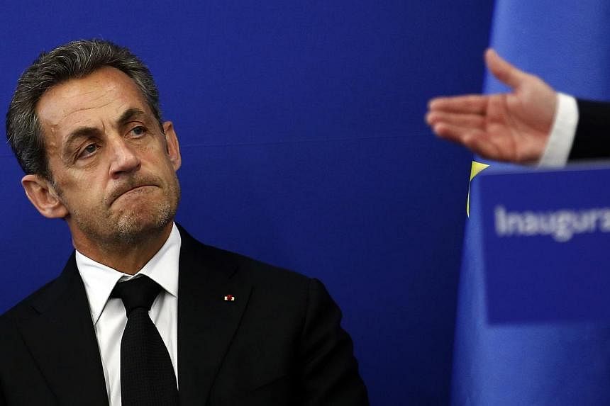 Former French president Nicolas Sarkozy attends the inauguration of the Institut Claude Pompidou, a new centre for the care and research of Alzheimer's disease, in Nice in this March 10, 2014, file picture. -- PHOTO: REUTERS