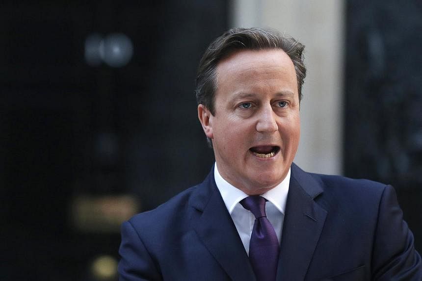 "The people of Scotland have spoken, and it's a clear result," a visibly relieved British Premier David Cameron said, standing outside the iconic door of his Downing Street official residence. -- PHOTO: REUTERS