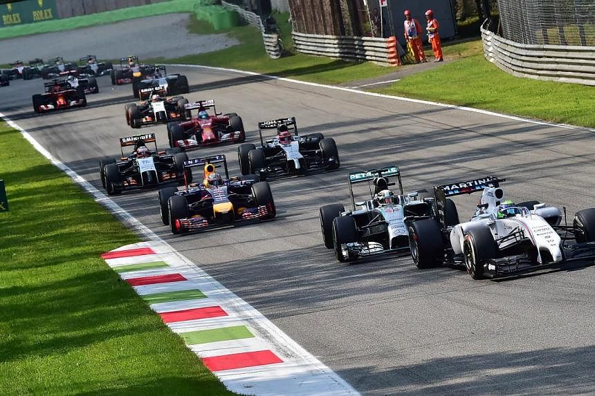Williams' Brazilian driver Felipe Massa steers his car during the Italian Formula One Grand Prix at the Autodromo Nazionale circuit in Monza on Sept 7, 2014. -- PHOTO: AFP