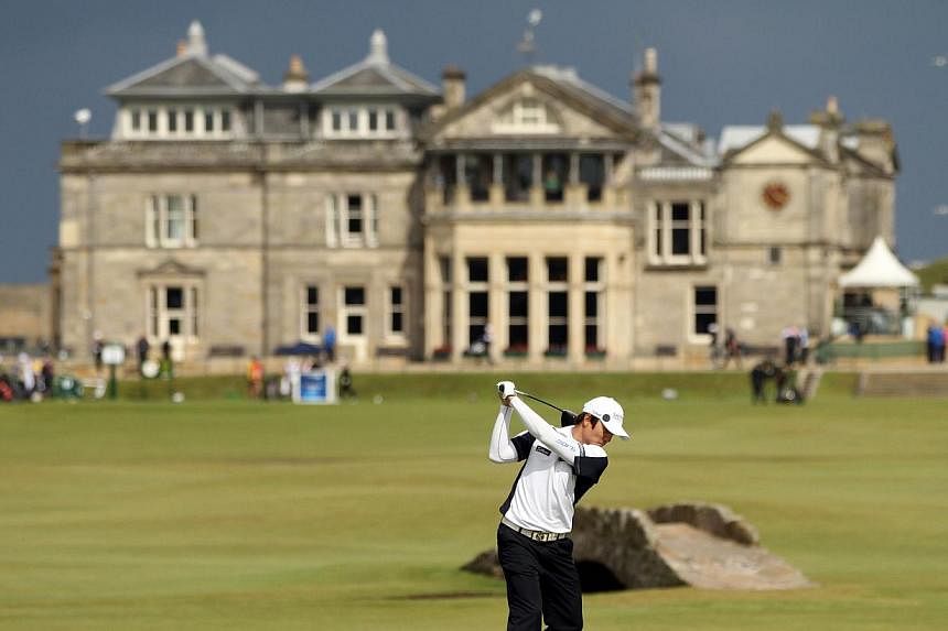 In this file picture taken on July 15, 2010, Korean golfer Kim Kyung-tae plays his tee shot on the 18th during his opening round on the first day of the British Open Golf Championship at St Andrews in Scotland. The Royal and Ancient Golf Club of St A